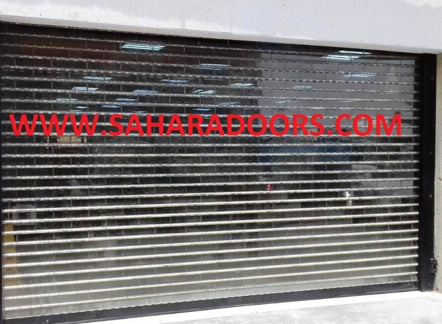 Polycarbonate vs Aluminum Rolling Shutters: The 2026 Industrial Selection Guide